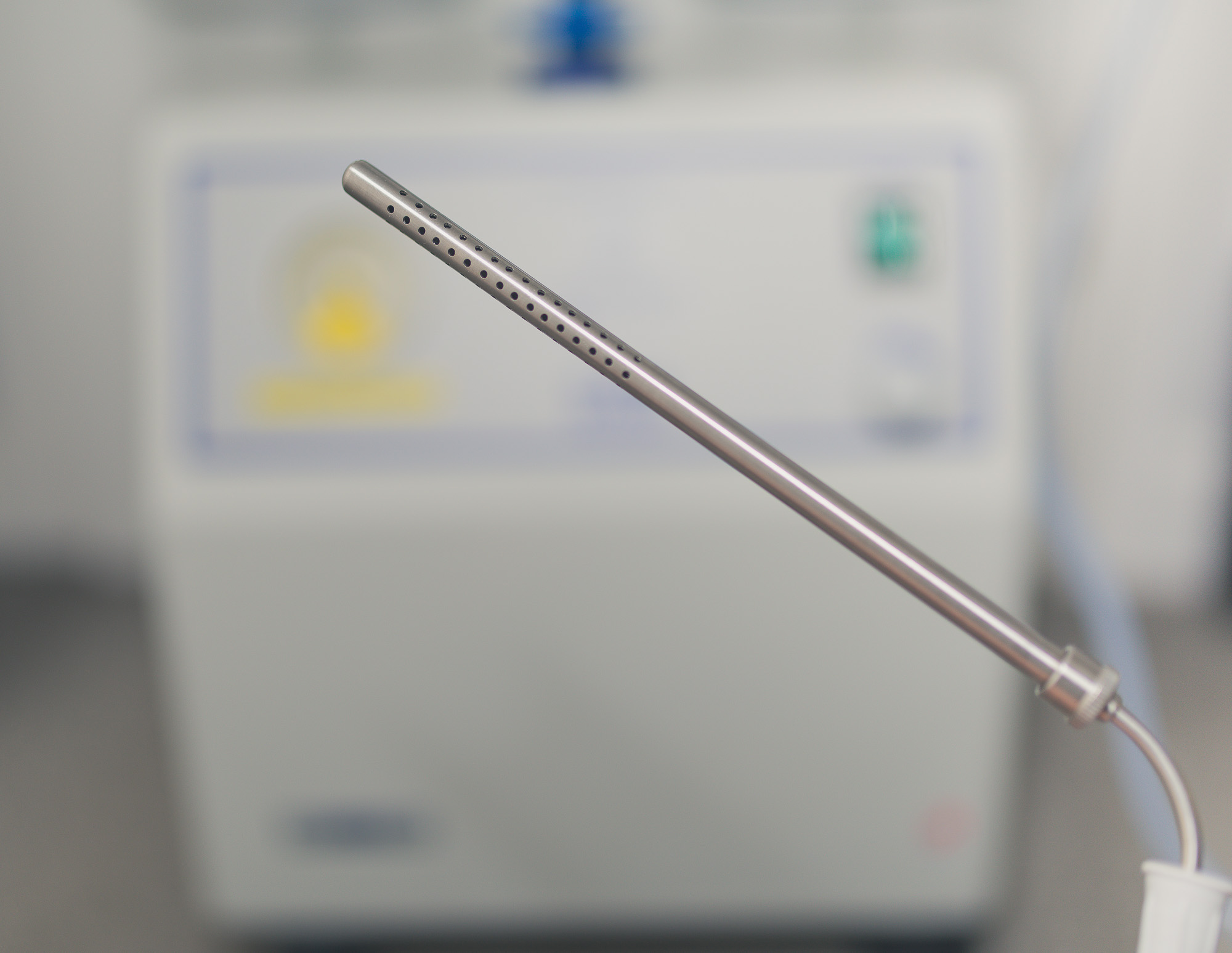 Veterinary surgical suction handpiece and suction unit used during small animal surgery.